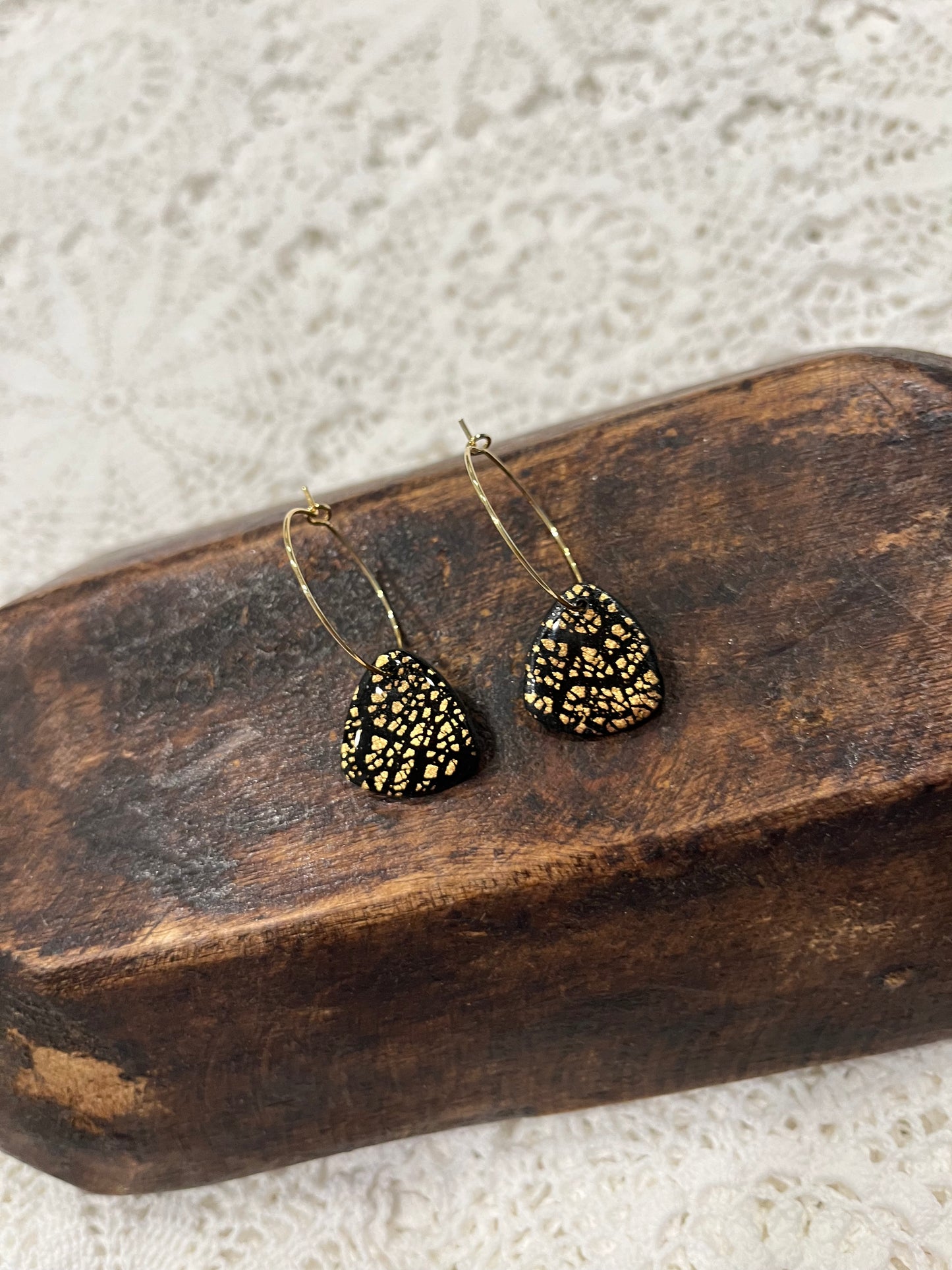 Triangle hoop black and gold